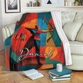 Colorful archery throw blanket draped over a sofa, featuring a geometric archer and bow design