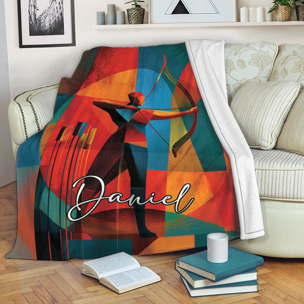 Colorful archery throw blanket draped over a sofa, featuring a geometric archer and bow design