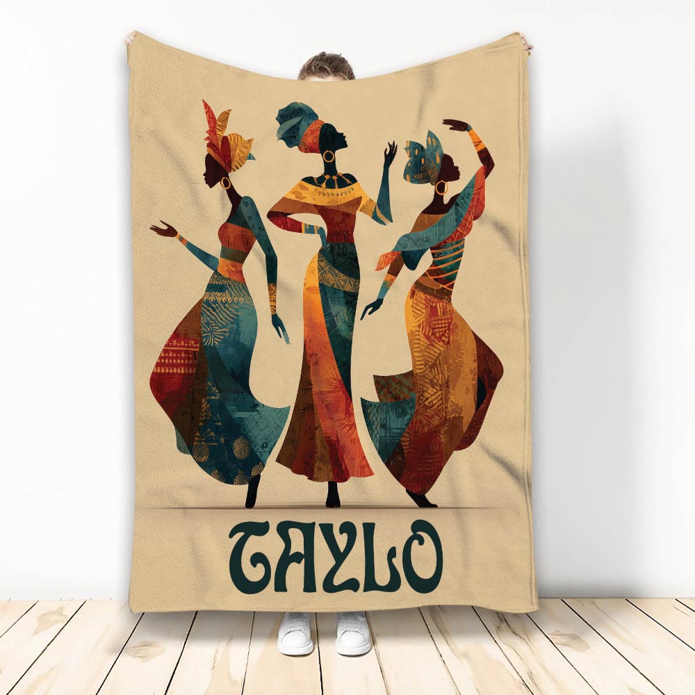 African-inspired throw blanket featuring three women in colorful patterned clothing and headwear
