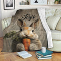 Rabbit blanket draped over a sofa with a realistic carrot-holding bunny design in a cozy living room