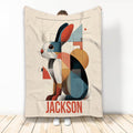 Geometric rabbit throw blanket with colorful modern artwork displayed in a standing lifestyle view