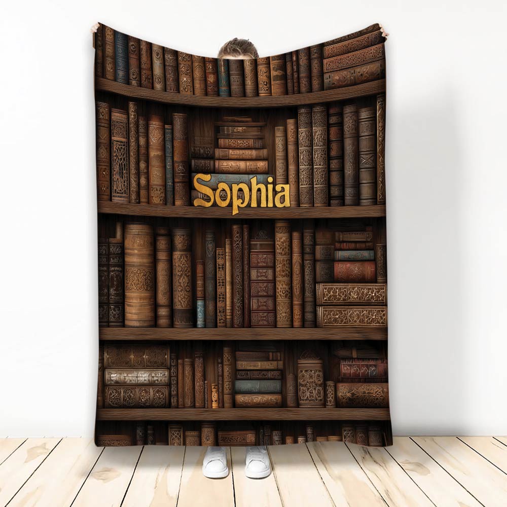 Book-themed blanket displayed upright with an ornate vintage bookshelf design in rich brown tones