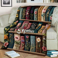 Close view of a floral bookshelf blanket with richly colored illustrated book spines