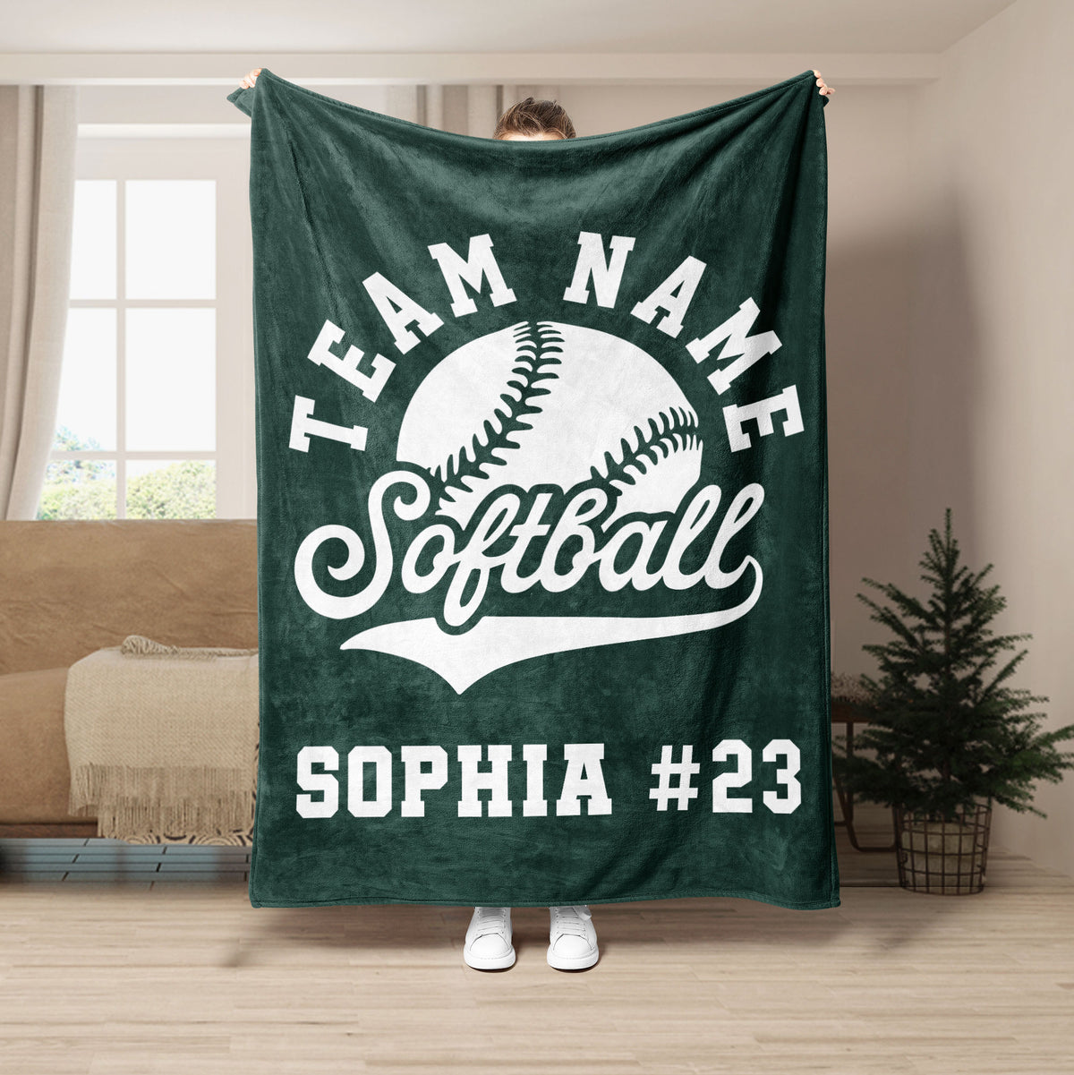 Green softball throw blanket with white softball artwork and a spirited team-inspired design