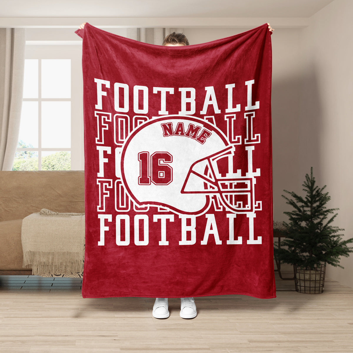 Red football blanket featuring a white helmet graphic and bold sports typography