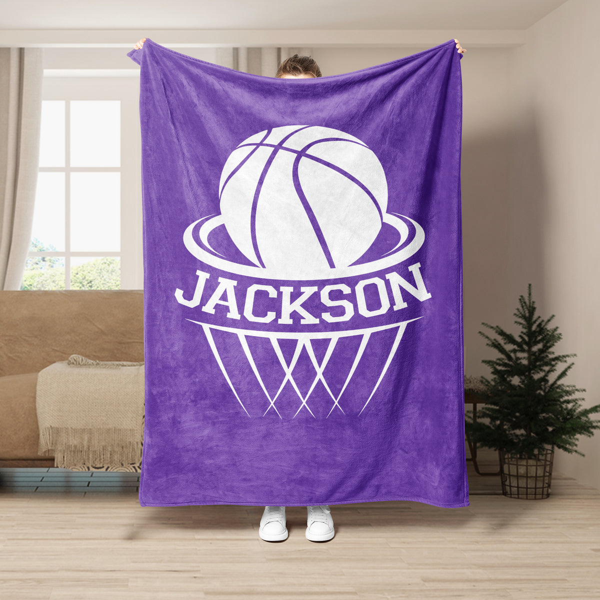Purple basketball throw blanket displayed in a living room with white basketball artwork