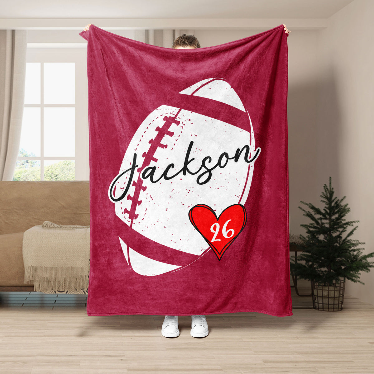 Red football throw blanket featuring white football artwork and a bright heart accent