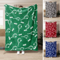 Green tennis throw blanket displayed with white racket and ball artwork in multiple color options