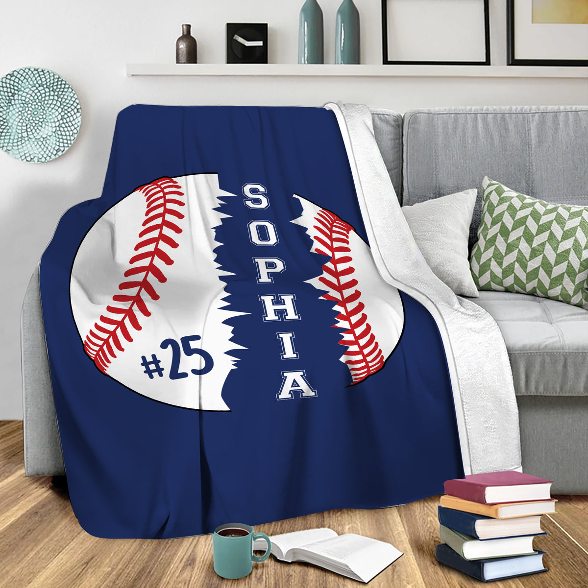 Baseball throw blanket draped over a gray sofa in a cozy living room setting