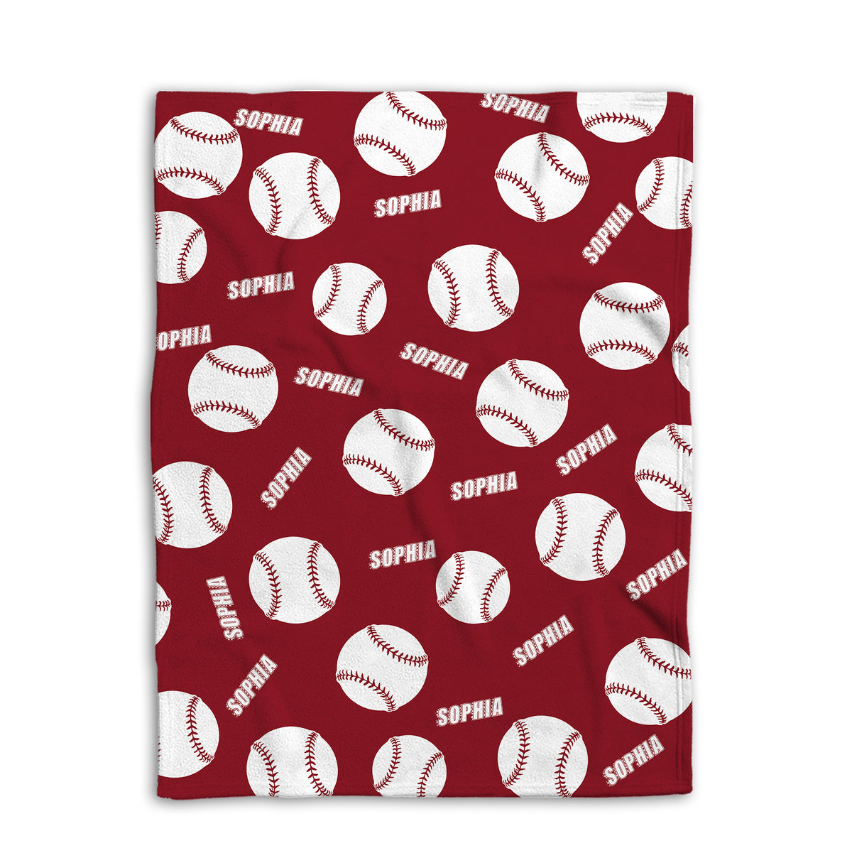 Close detail view of a red softball blanket with repeating white balls and bold sports design