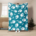 Teal football throw blanket featuring an all-over pattern of white football illustrations