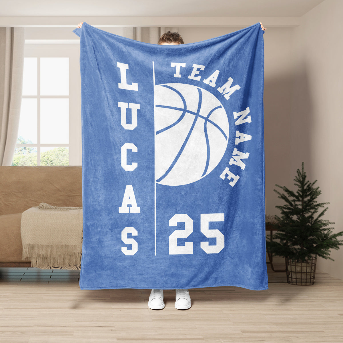 Blue basketball throw blanket displayed vertically with bold white team-inspired artwork