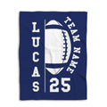 Navy football blanket shown flat with a large white football graphic and athletic lettering