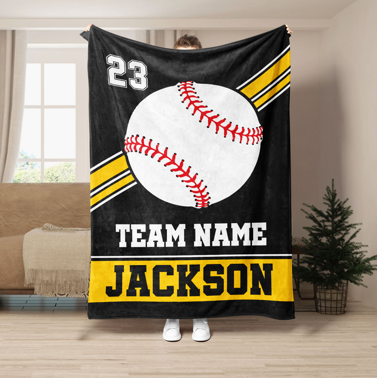 Black and yellow baseball throw blanket featuring an oversized baseball graphic and athletic stripe details