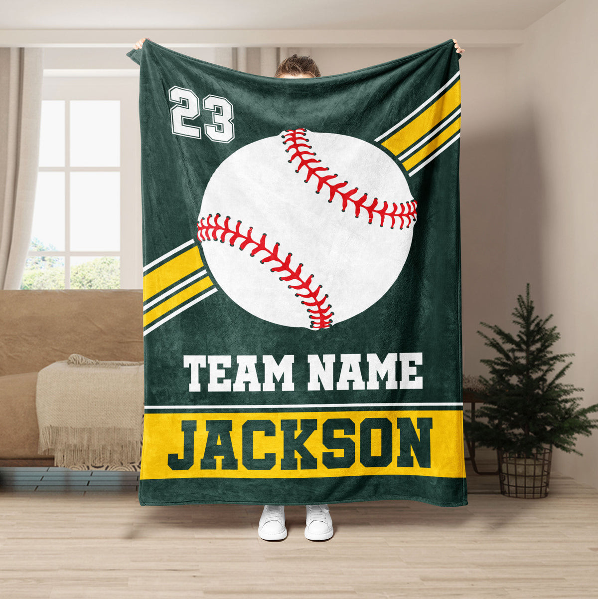 Green and yellow baseball throw blanket with oversized ball artwork and bold team-style color blocking