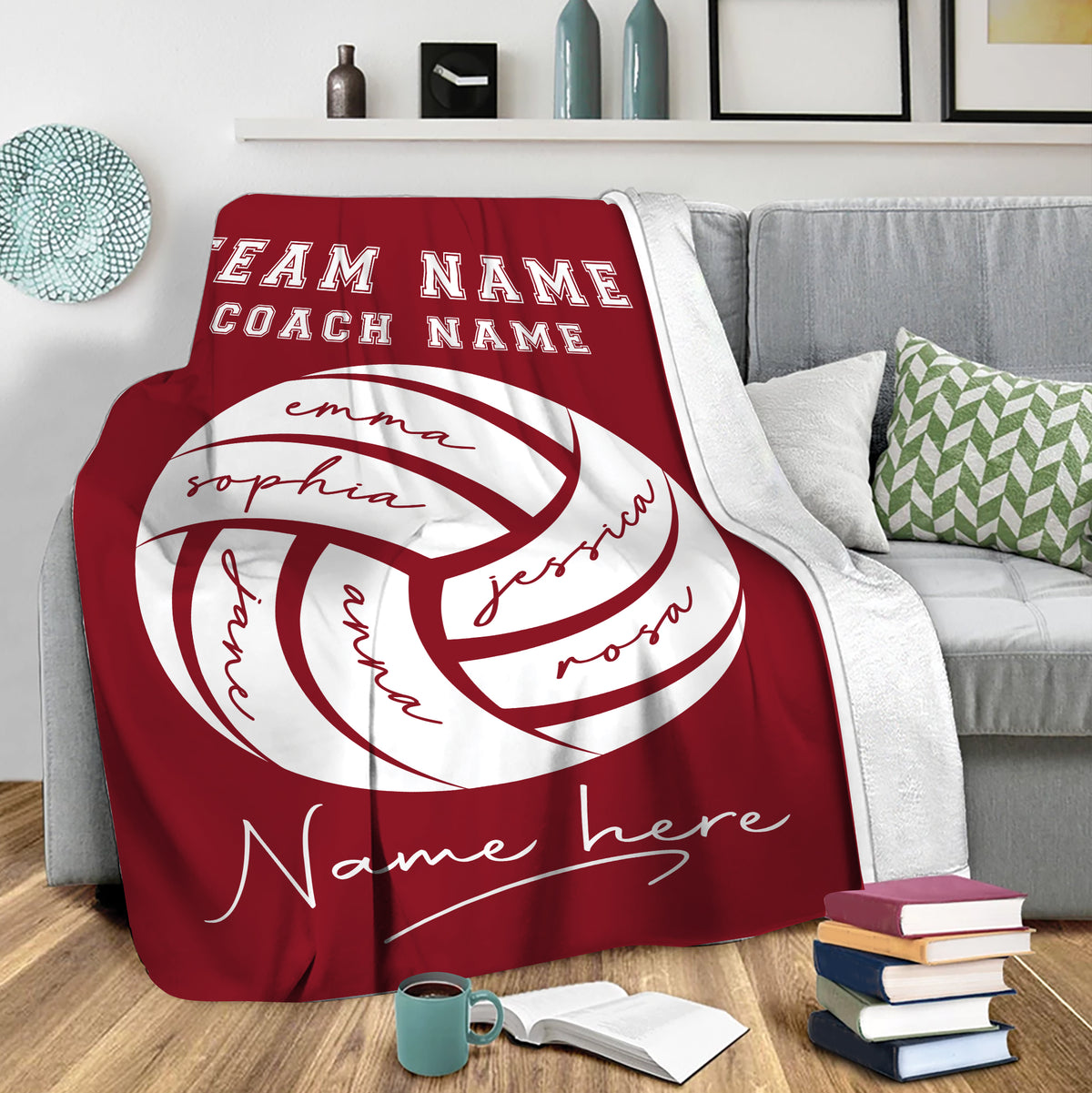 Red volleyball throw blanket draped over a sofa in a cozy living room setting