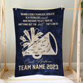 Cheerleading coach tribute blanket displayed on a bedroom frame with megaphone team artwork