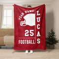 Red football throw blanket featuring a white helmet graphic and strong collegiate-style sports artwork