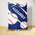 Blue baseball throw blanket shown hanging with oversized white baseballs and red stitching