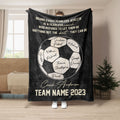 Black soccer coach blanket featuring a soccer ball design and inspirational team message