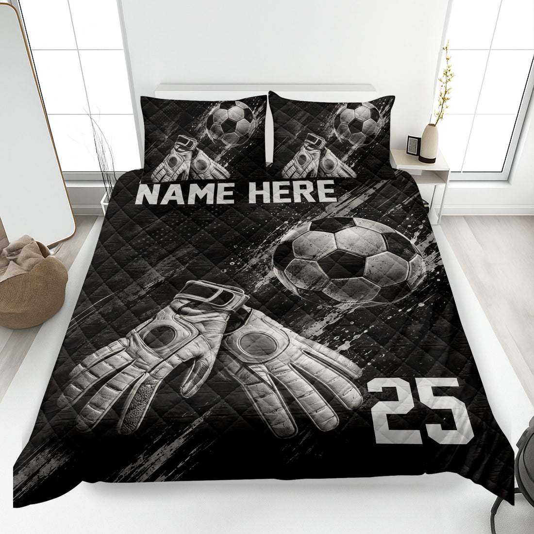 Black soccer quilt bedding set displayed on a bed with soccer balls and goalkeeper gloves