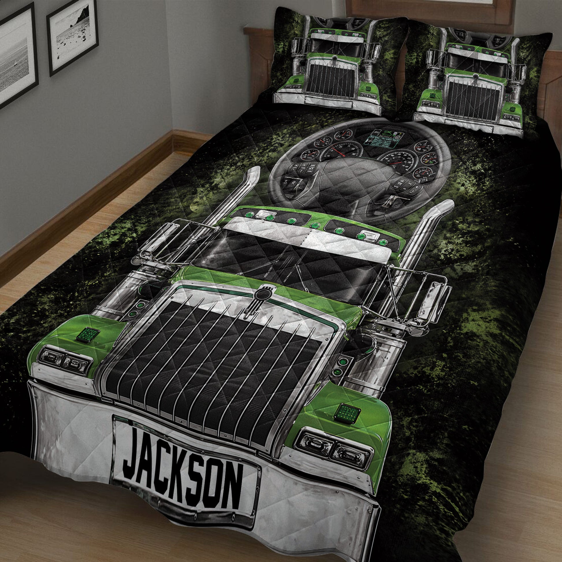 Close angled view of black and green semi-truck quilt artwork on a bedroom bed