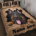 German Shepherd quilt blanket displayed on a bed with cracked stone artwork and black dog portraits