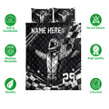 Black and white racing quilt bedding set with helmeted driver artwork and checkered flag design