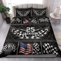 Racing quilt bedding styled in a bedroom with checkered flags, eagle artwork, and dramatic black racing graphics