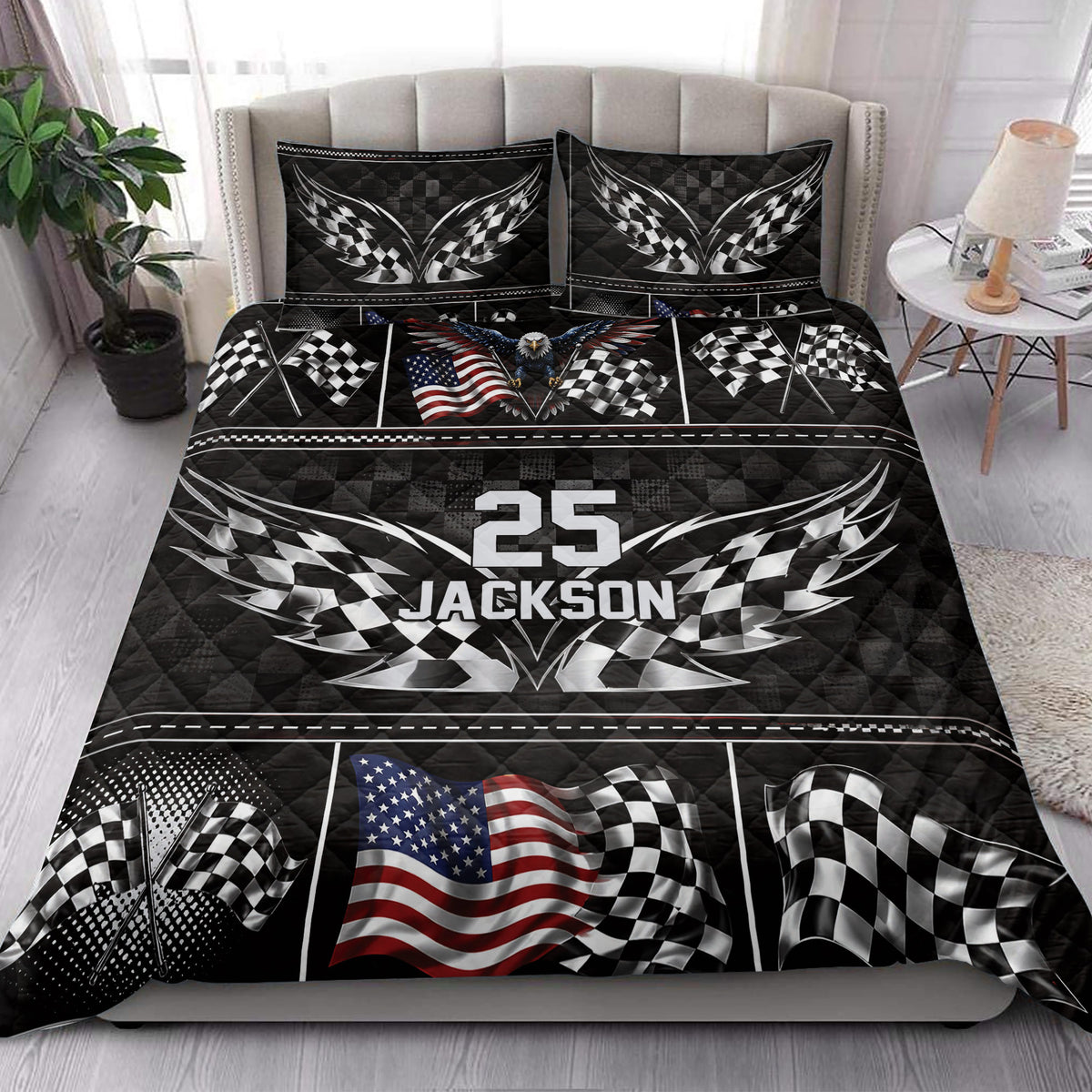 Racing quilt bedding styled in a bedroom with checkered flags, eagle artwork, and dramatic black racing graphics