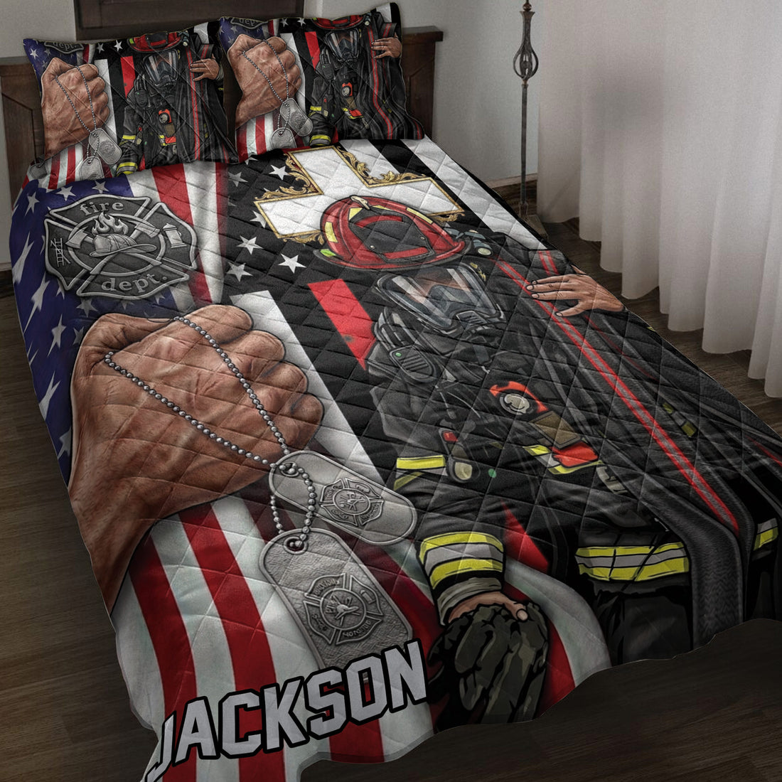 Firefighter quilt blanket displayed on a bed with patriotic stripes, fire gear, helmet, dog tags, and department emblem artwork