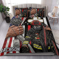 Firefighter quilt bedding set styled in a bedroom with helmet, turnout gear, dog tags, and patriotic fire department artwork