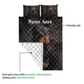 Dachshund quilt blanket detail showing the printed dog design and white quilted backing