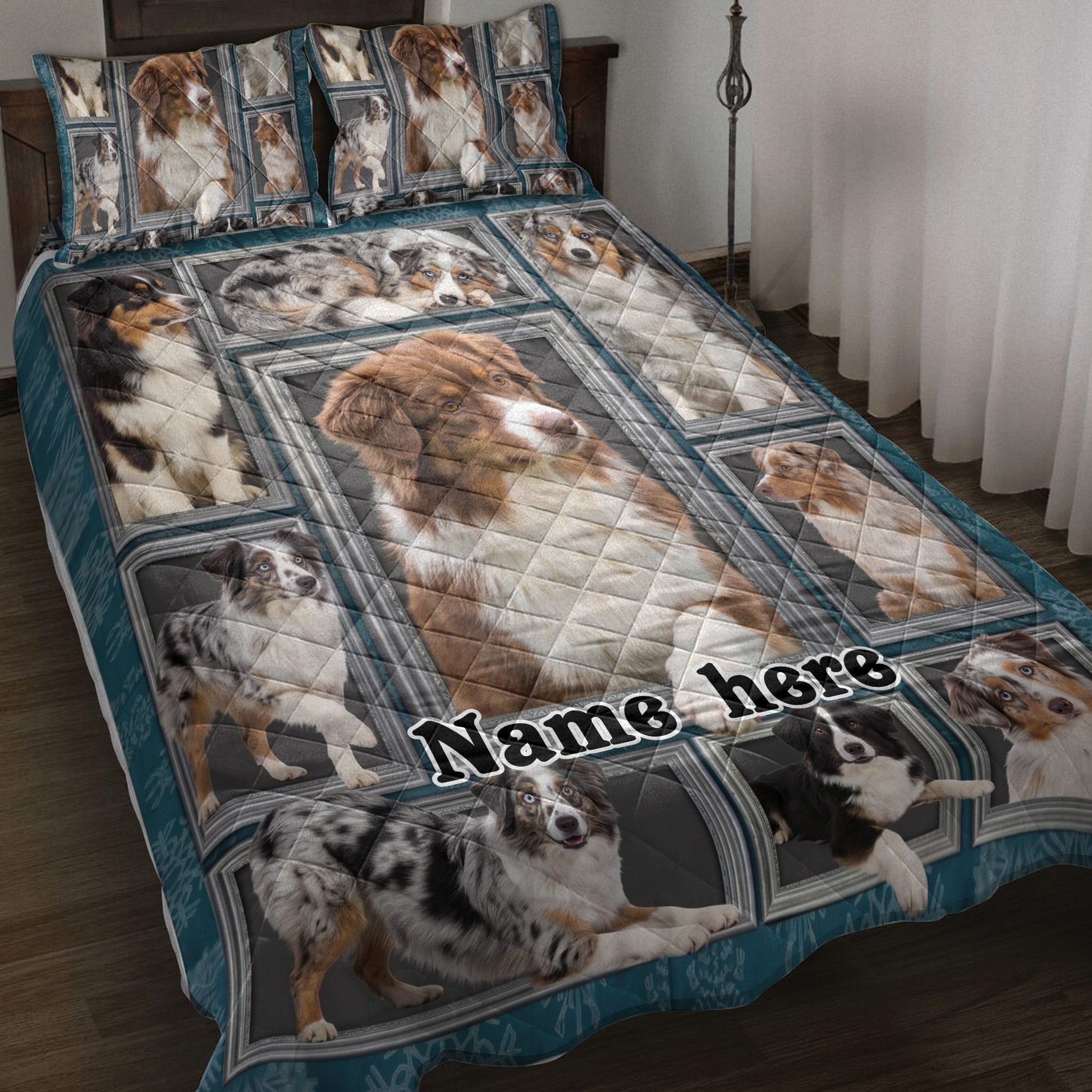 Australian Shepherd quilt blanket displayed on a bed with framed portraits of multiple dogs in teal and charcoal artwork