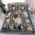 Australian Shepherd quilt bedding styled in a bright bedroom with coordinated dog portrait artwork across the bed