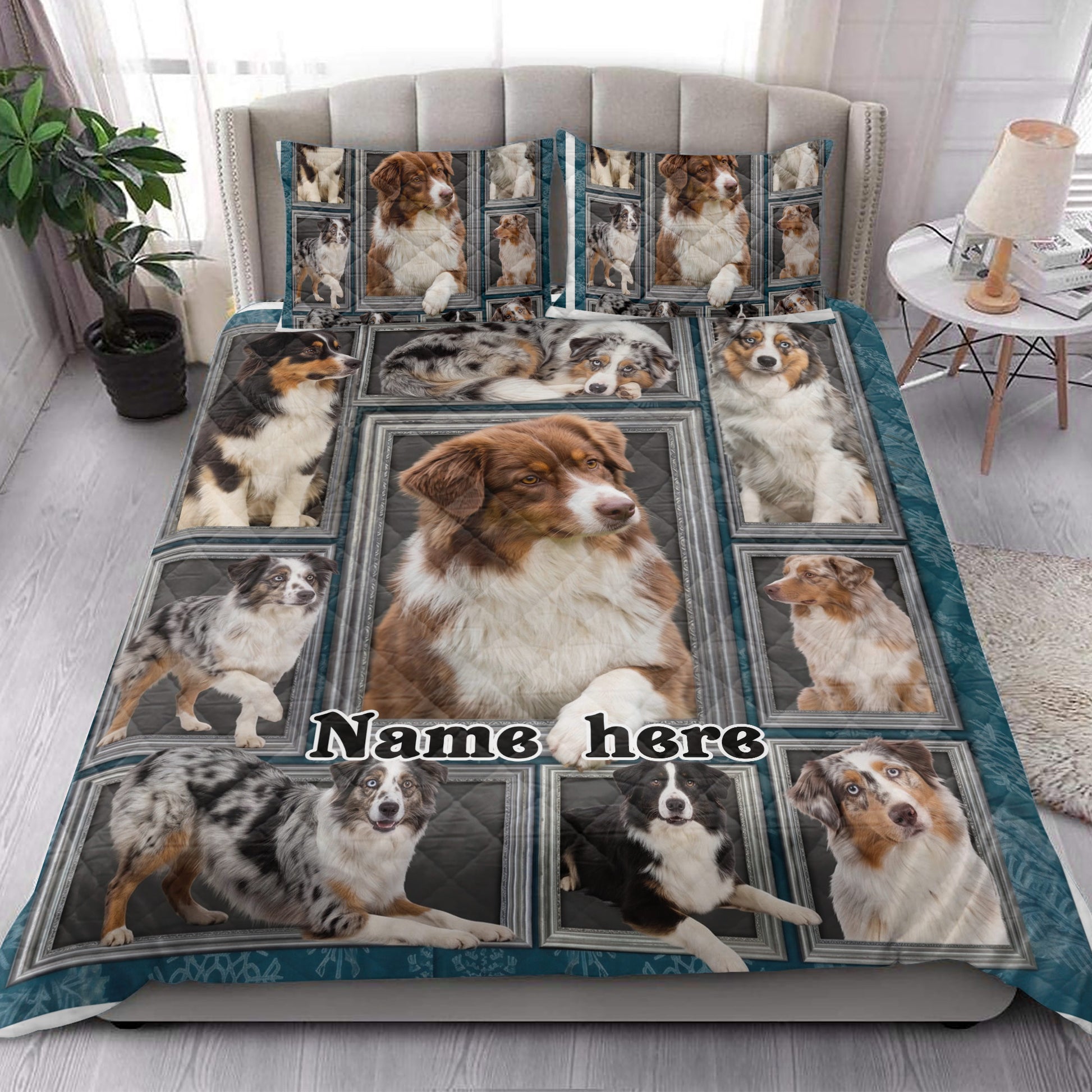 Australian Shepherd quilt bedding styled in a bright bedroom with coordinated dog portrait artwork across the bed