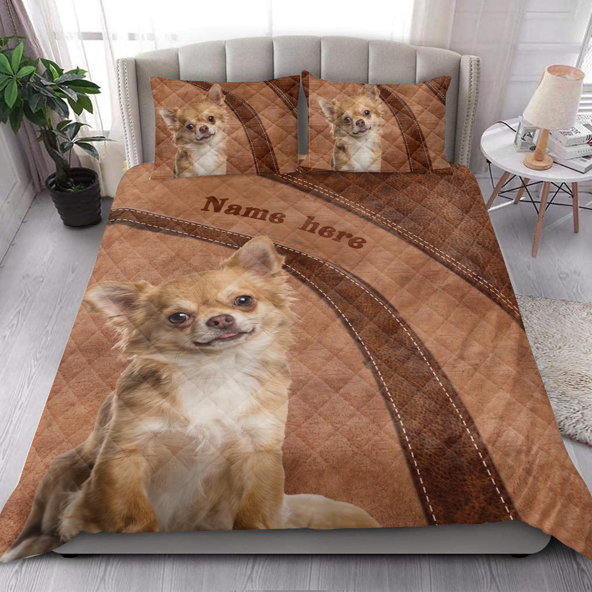 Chihuahua quilt blanket displayed in a bright bedroom with prominent dog portrait artwork