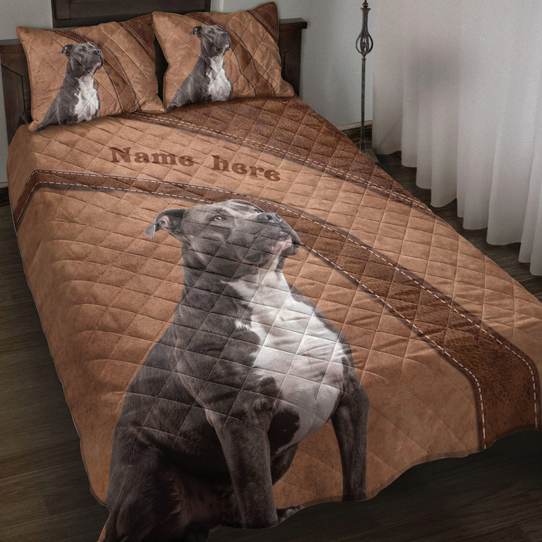 American Staffordshire dog quilt blanket styled on a bed with matching dog artwork and brown leather-inspired accents