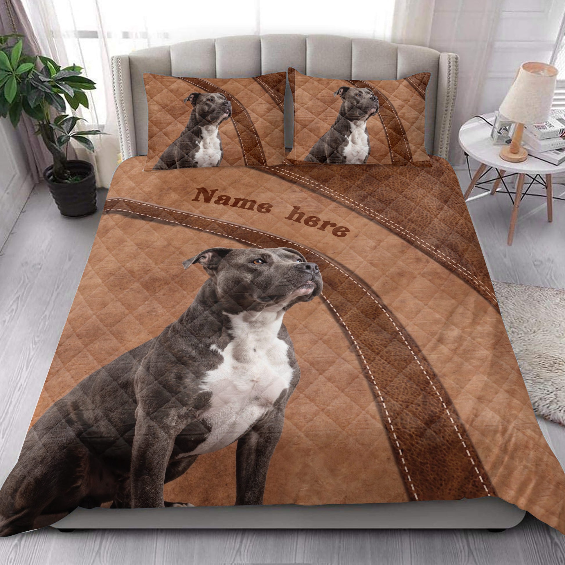 American Staffordshire dog quilt blanket presented in a bright bedroom with large dog artwork
