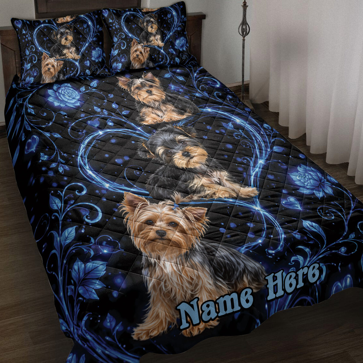 Yorkshire Terrier quilt blanket displayed on a bed with blue hearts, roses, and swirling floral artwork