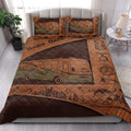 Camping quilt bedding styled in a bedroom with RV travel, mountain, forest, compass, and camping gear artwork