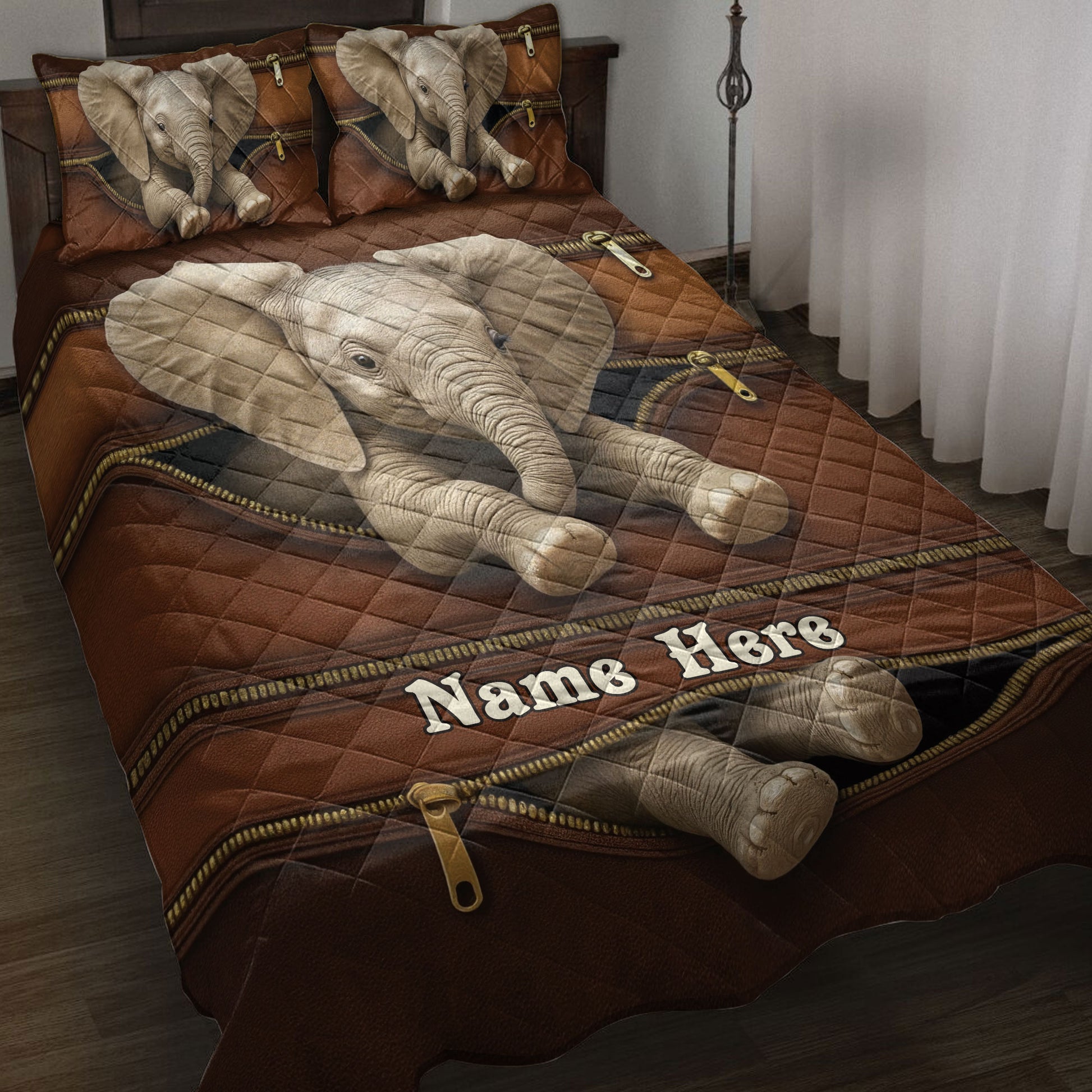 Brown elephant quilt bedding set displayed on a bed with elephant artwork and coordinating pillows
