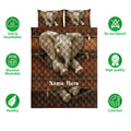Elephant quilt bedding set shown flat with large elephant artwork, brown tones, and matching pillows
