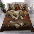 Elephant quilt bedding set styled in a bright bedroom with large elephant artwork and matching pillows