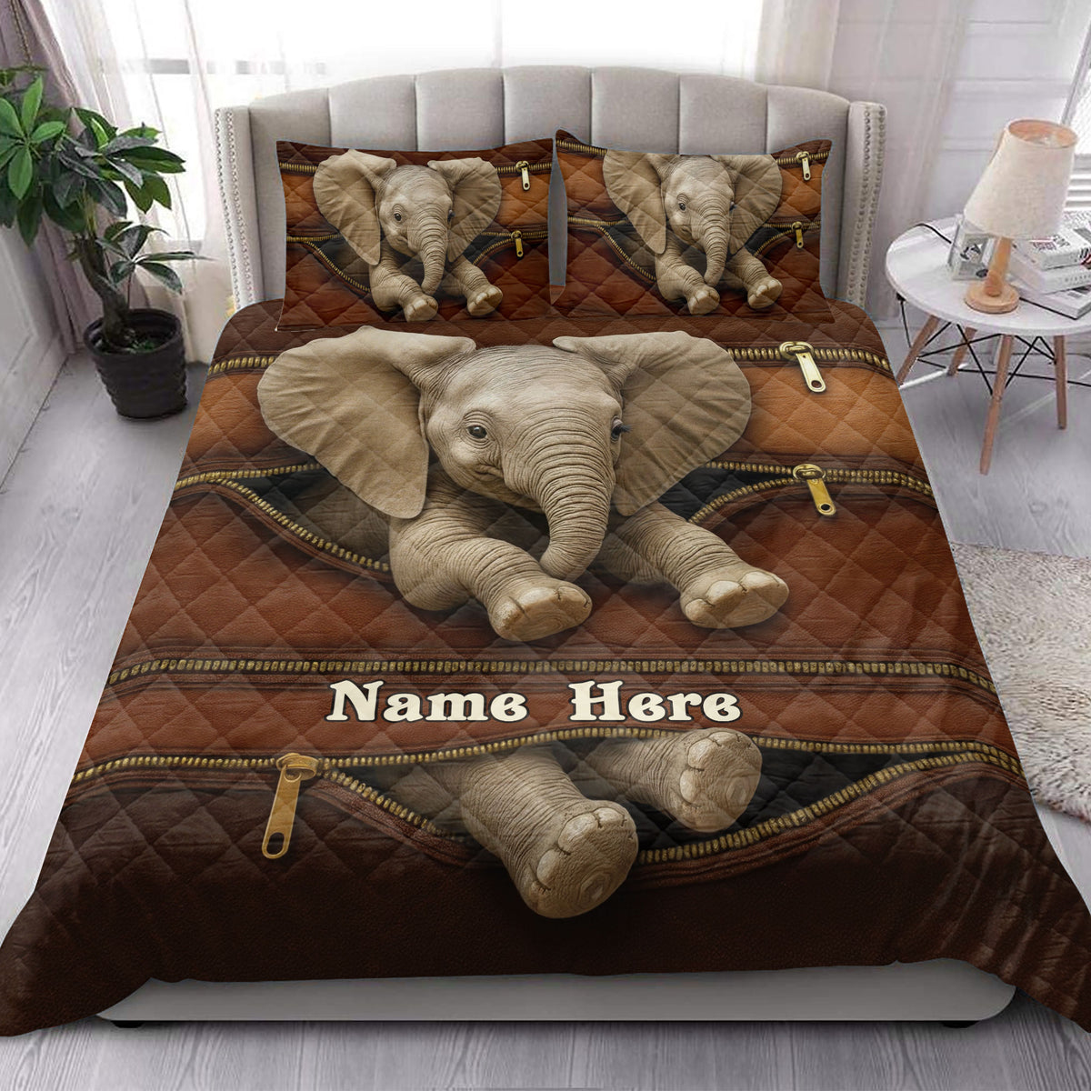 Elephant quilt bedding set styled in a bright bedroom with large elephant artwork and matching pillows