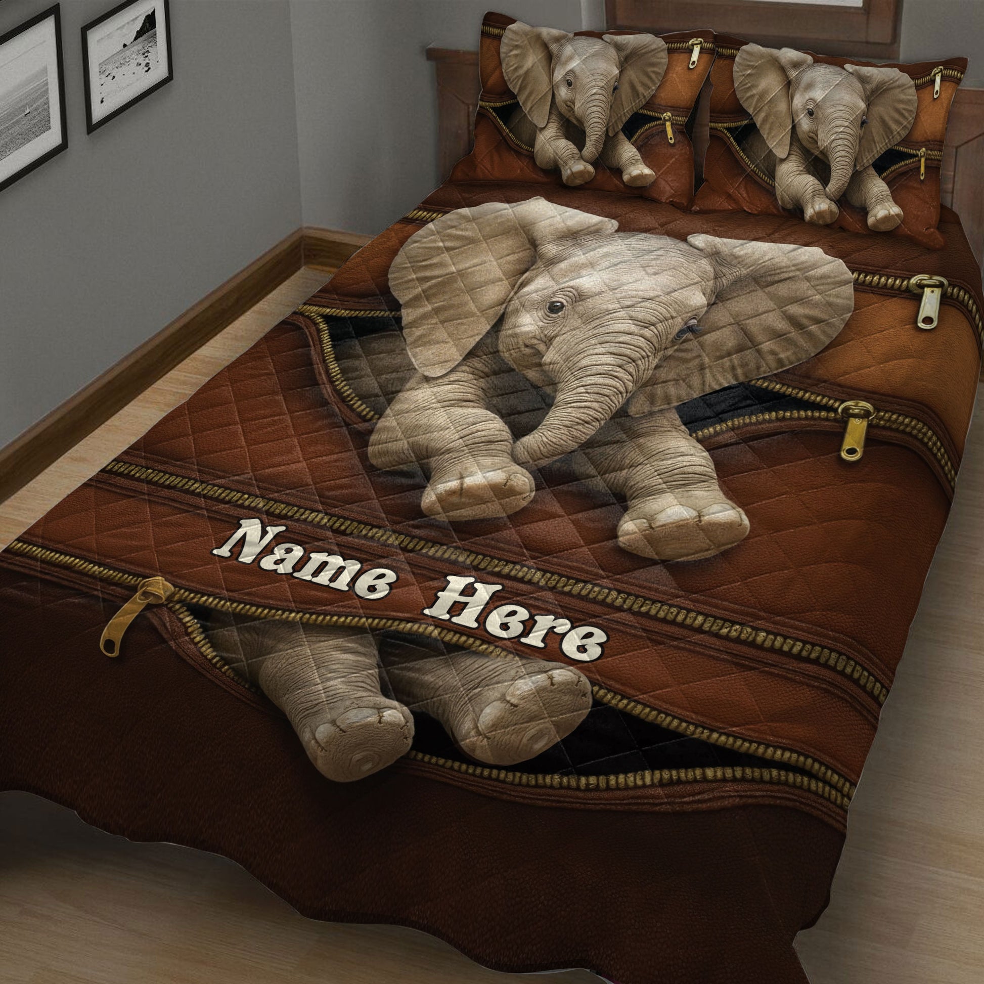 Close bedroom view of a brown elephant quilt with detailed elephant artwork and coordinating pillows