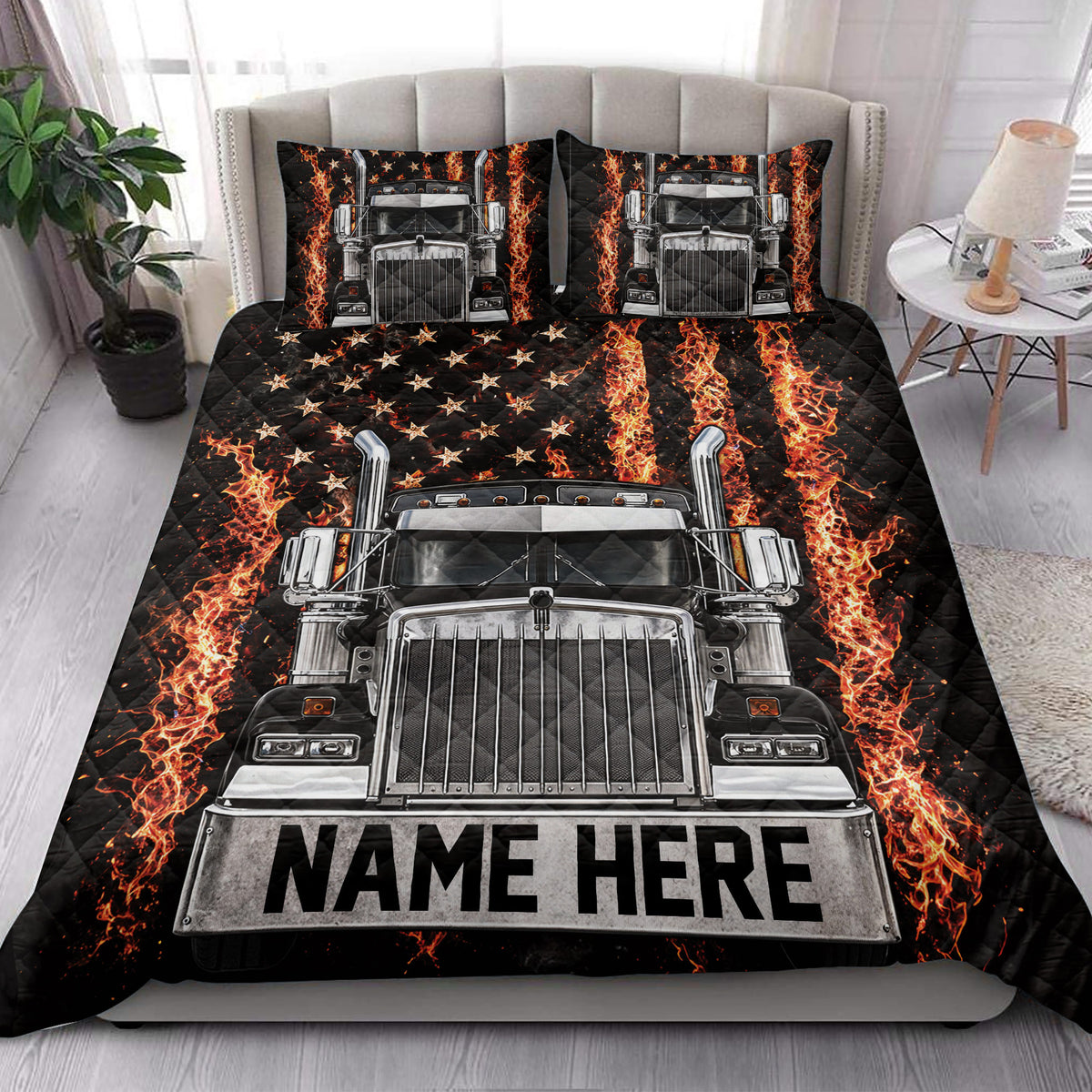 Bedroom presentation of a black trucker quilt blanket with flaming semi truck artwork and matching pillowcase design