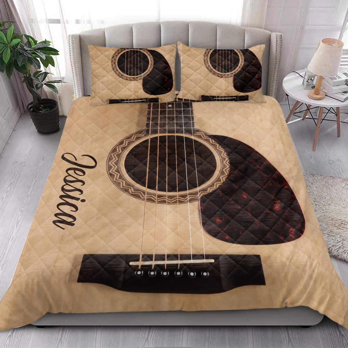 Acoustic guitar quilt bedding styled in a bright bedroom with matching guitar pillow designs