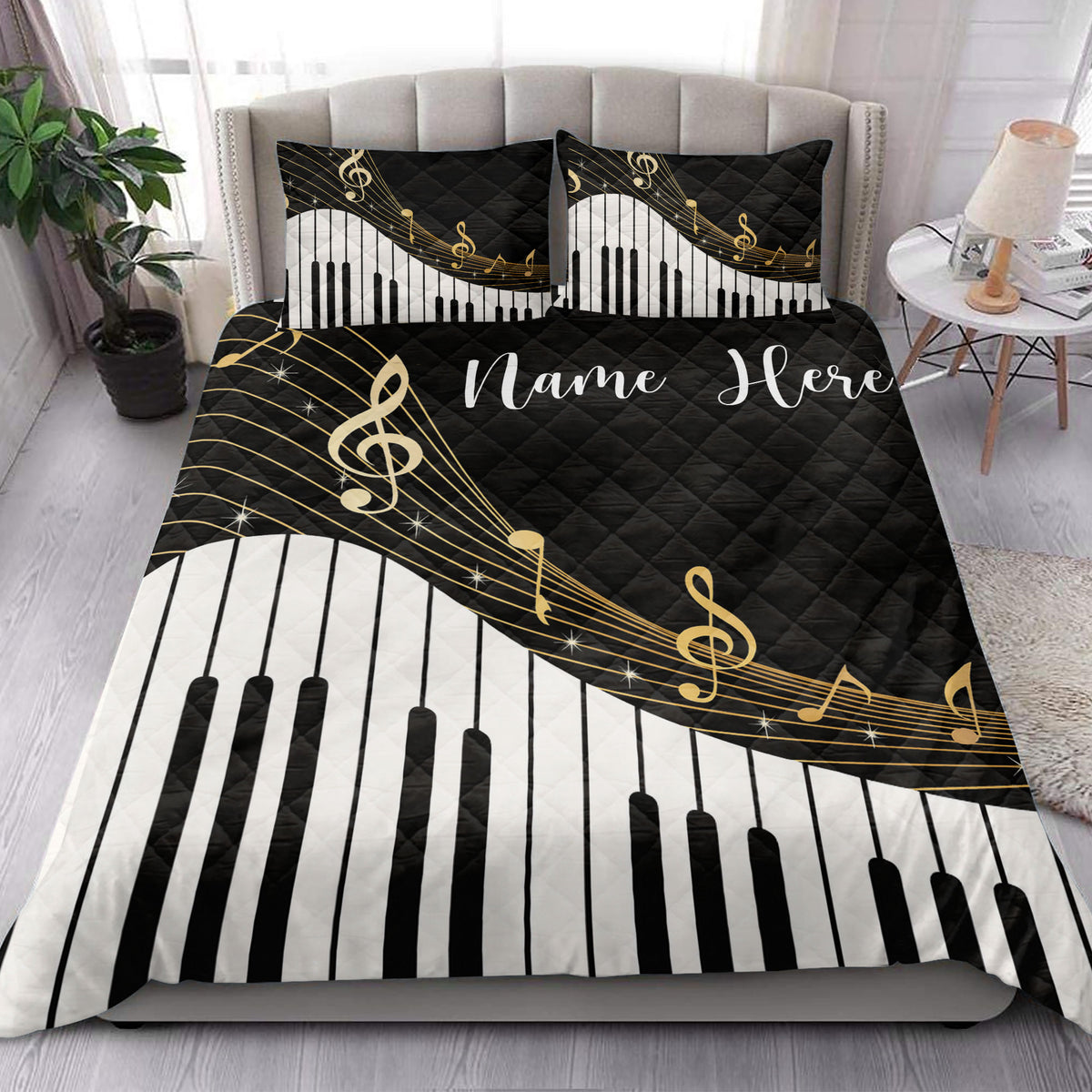 Piano-themed quilt bedding styled in a bright bedroom with black, white, and gold musical artwork