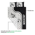 Wrestling quilt showing the printable side, stitched texture, and black and white artwork
